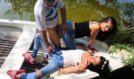 女孩子们骑着底特律男孩在河上玩耍，在清新空气中进行群交